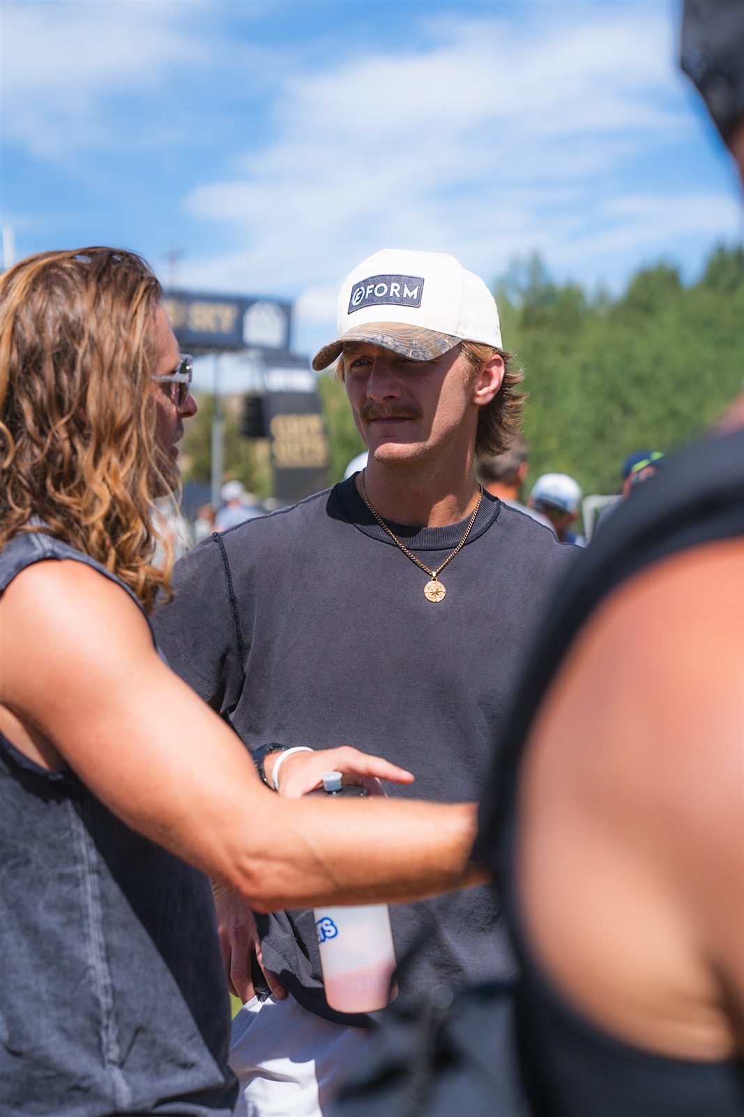 Dr. Bridger Cutler consulting with an athlete